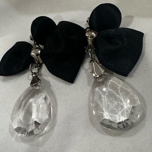 Clear Teardrop Crystal Drop Earrings suspended from black bow accent